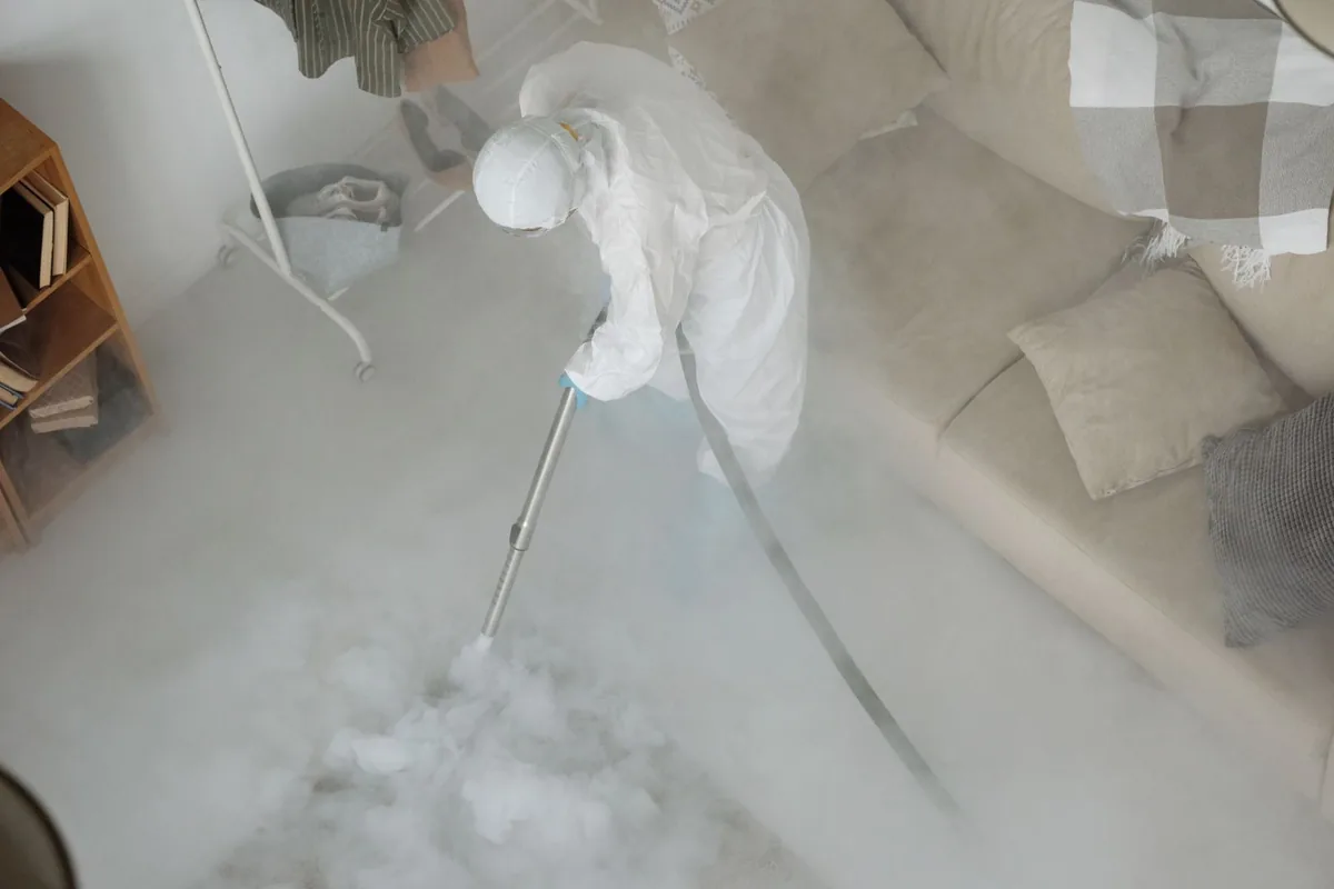 Biohazard cleanup technician in protective equipment, Fredericksburg, PA